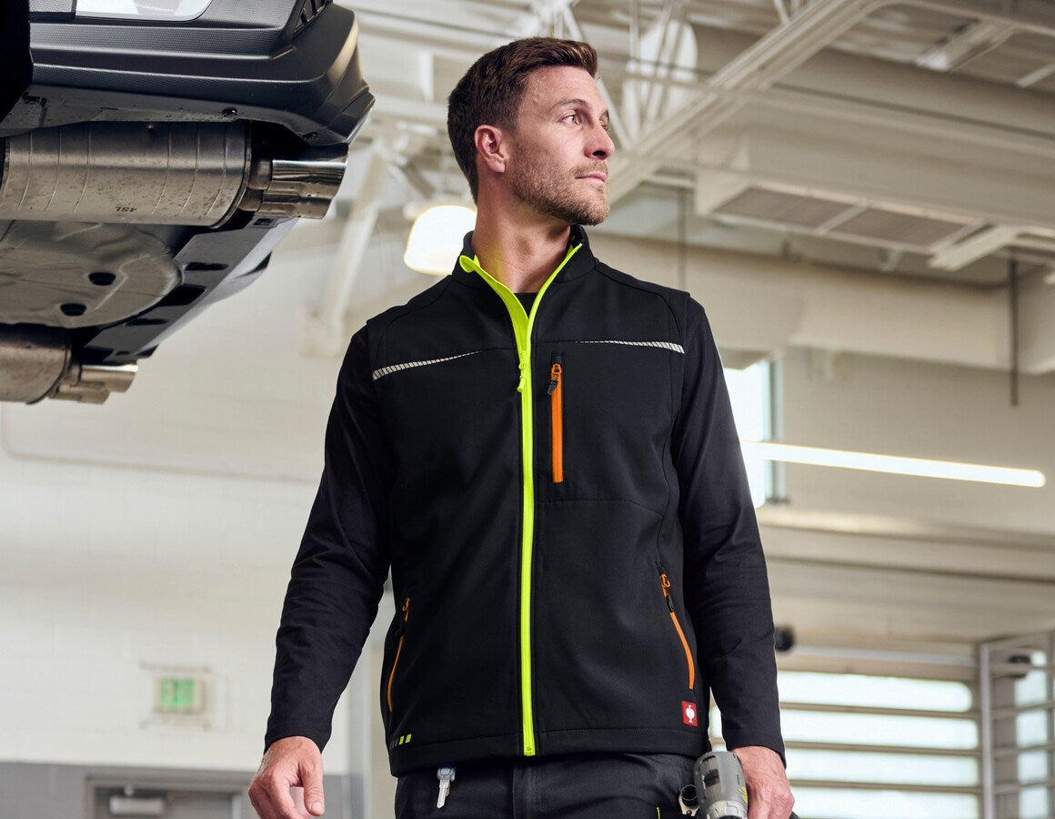 Main action image Softshell bodywarmer e.s.motion 2020 black/high-vis yellow/high-vis orange