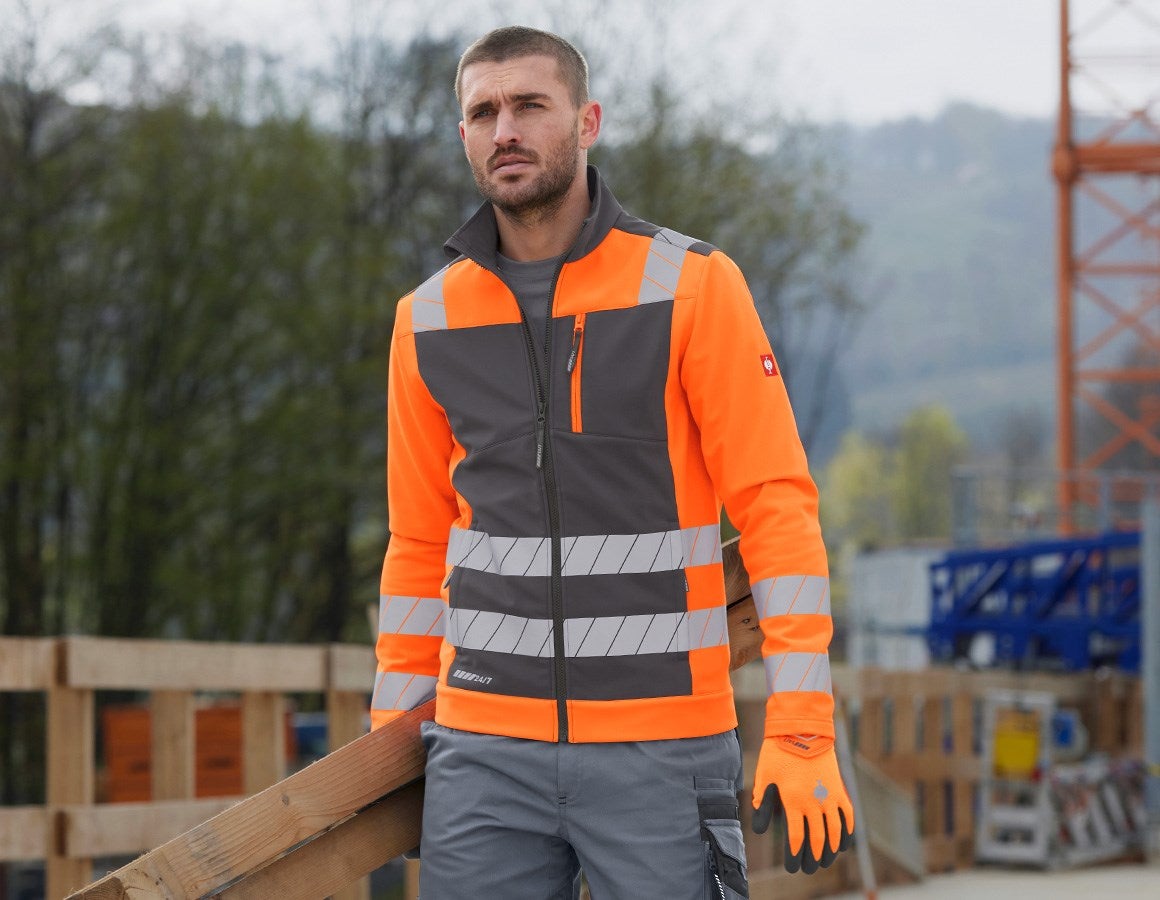 Main action image High-vis softshell jacket e.s.motion 24/7 anthracite/high-vis orange