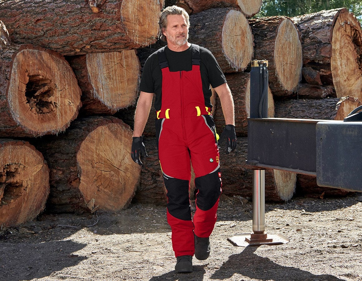 Main action image e.s. Forestry cut protection bib & brace, KWF red/high-vis yellow